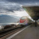 Treno Giruno in transito alla stazione di Immensee